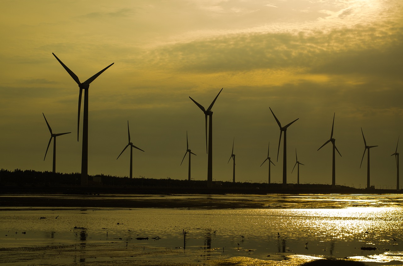 wind turbine on sunset sunset wind turbines free photo