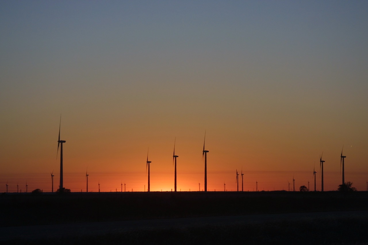 wind turbines alternate energy sunset free photo