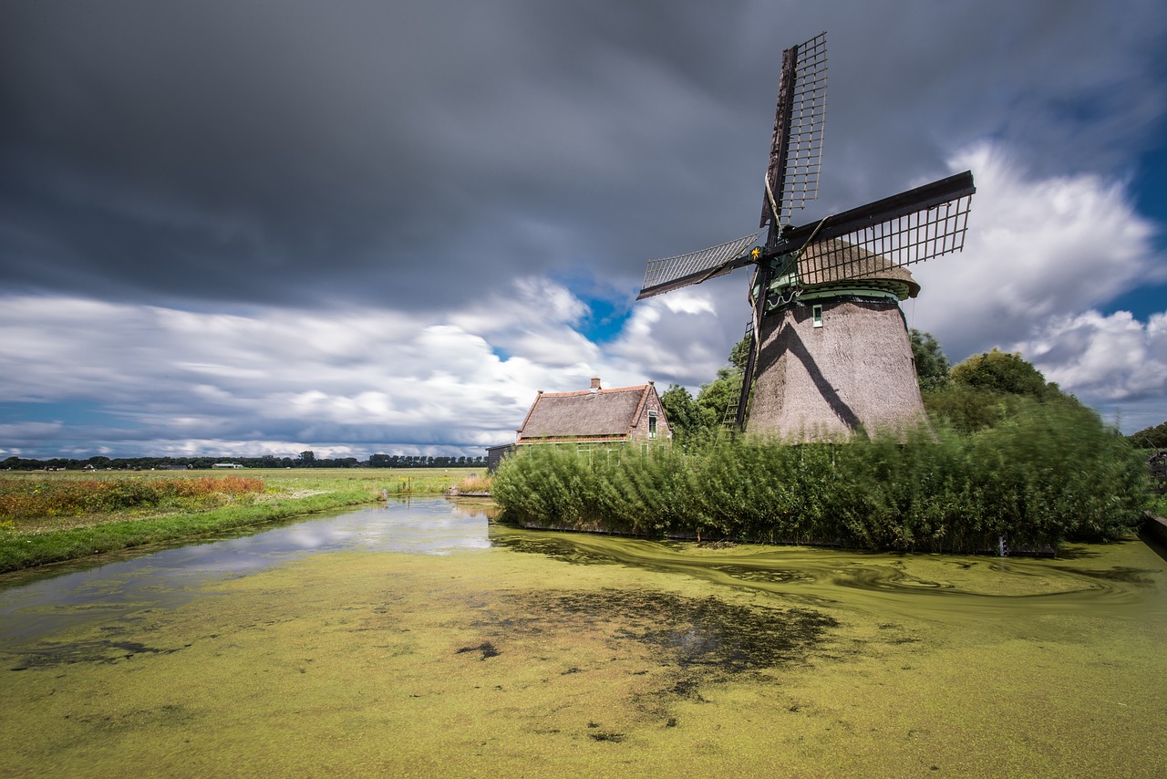 windmill pond clouds free photo