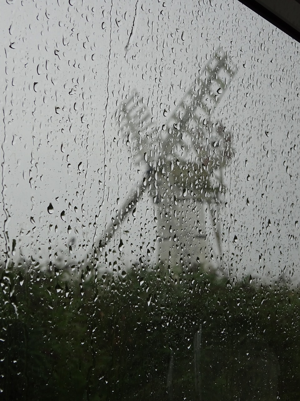 windmill white windmill rainy day free photo