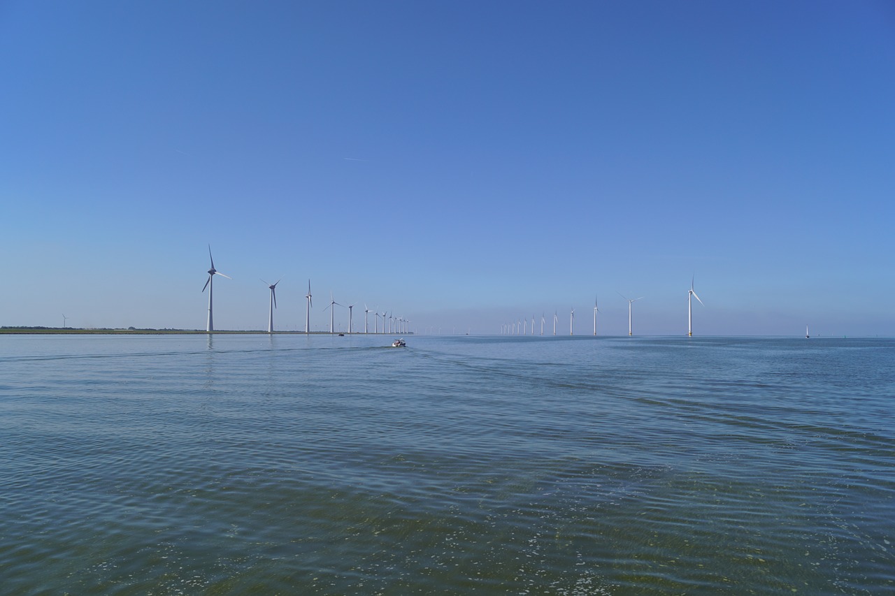 windmills  ijsselmeer  water free photo