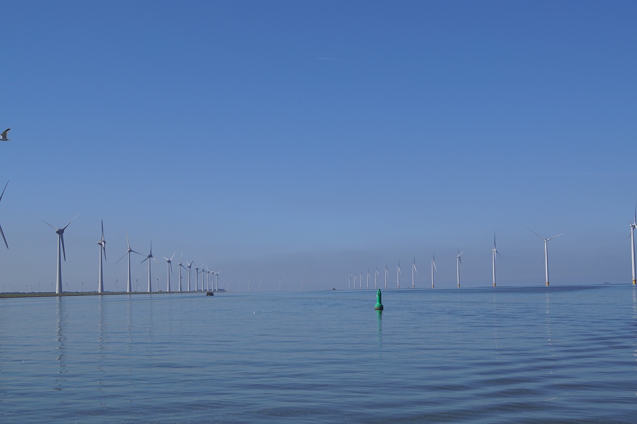 windmills  ijsselmeer  water free photo