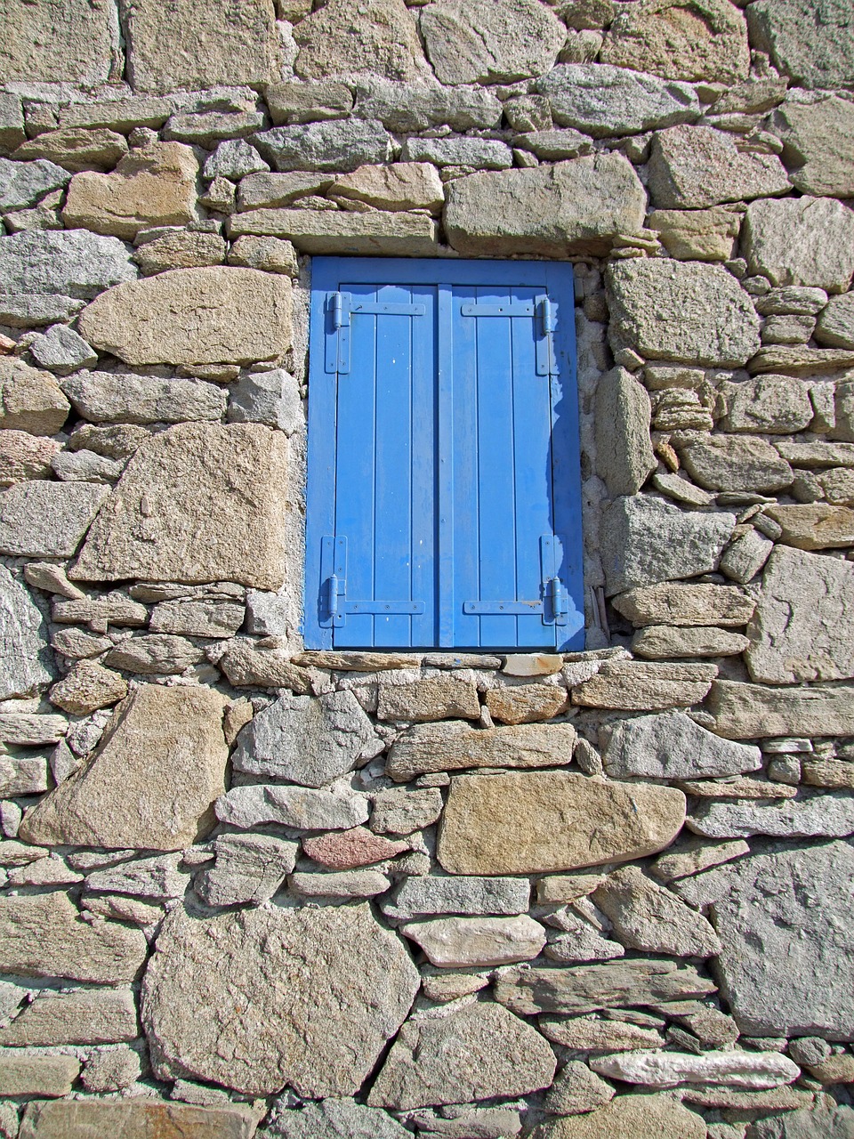 window blue stone wall free photo