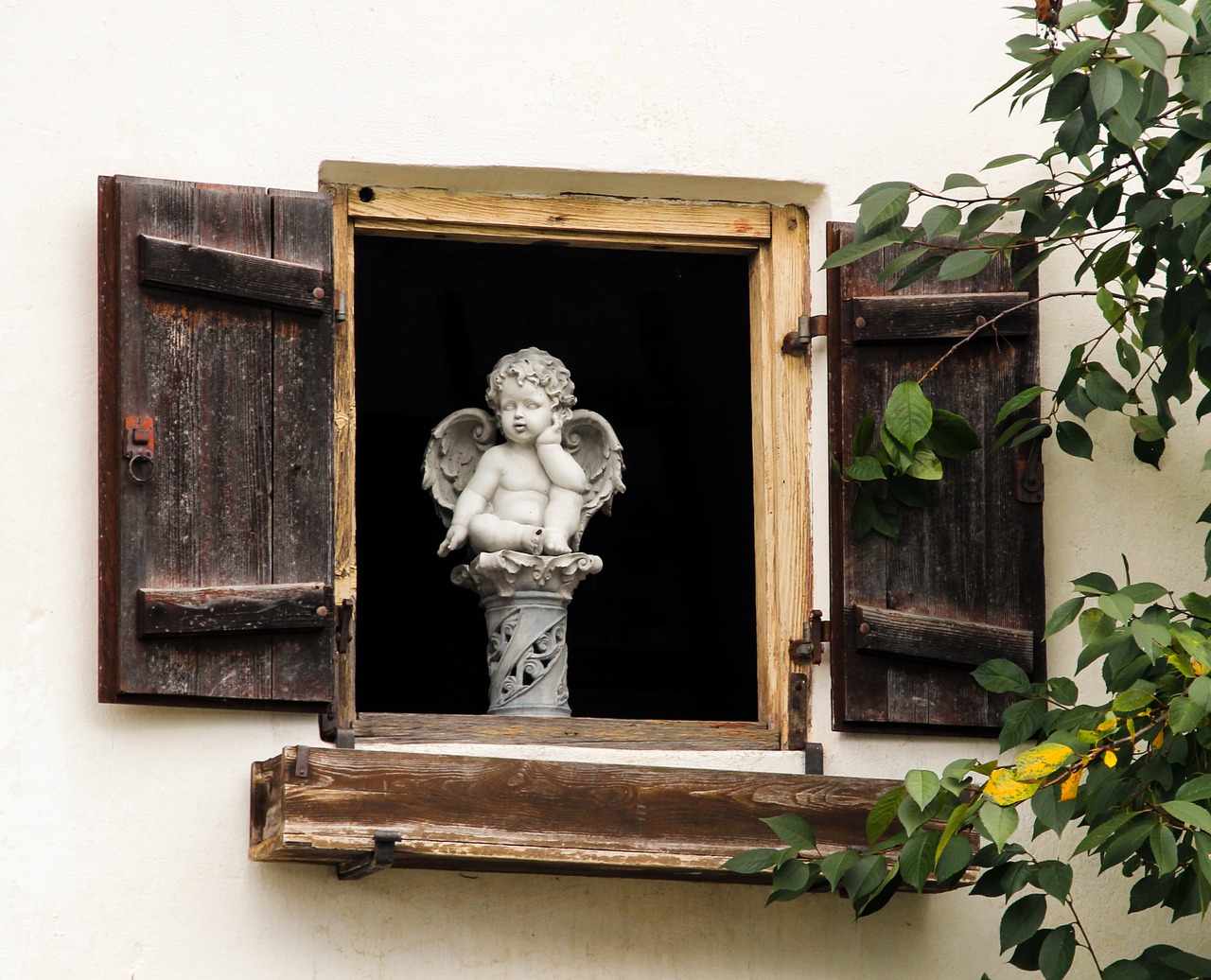 window angel figure free photo