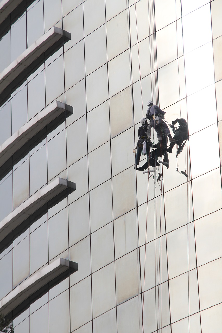 window cleaner window cleaning office tower free photo