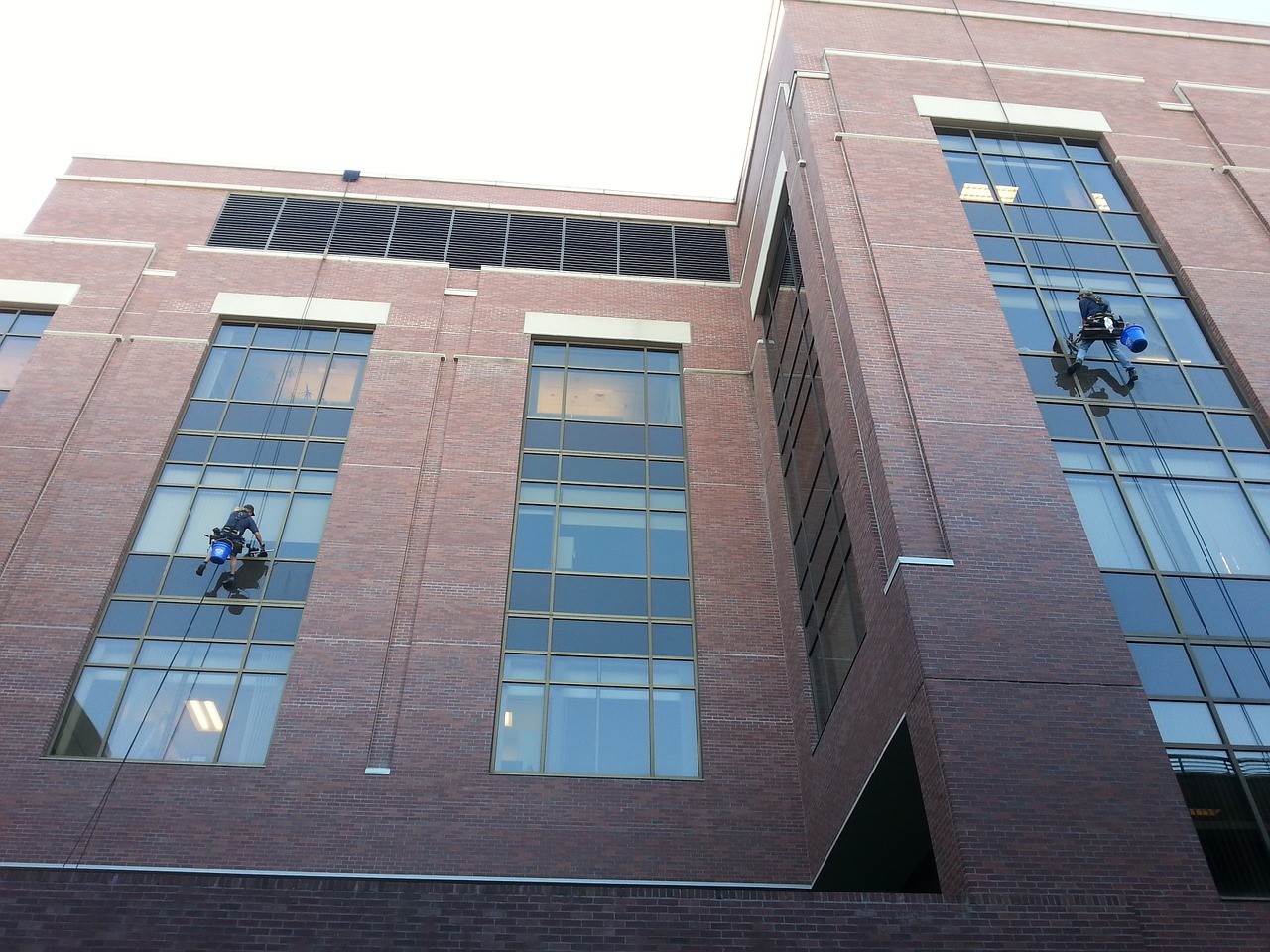 window cleaners building squeegee free photo