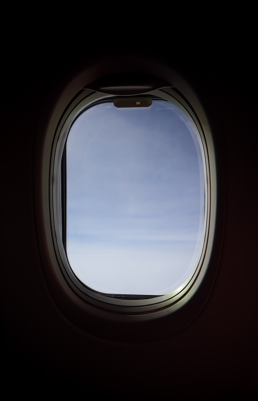 window shade  airplane  window free photo