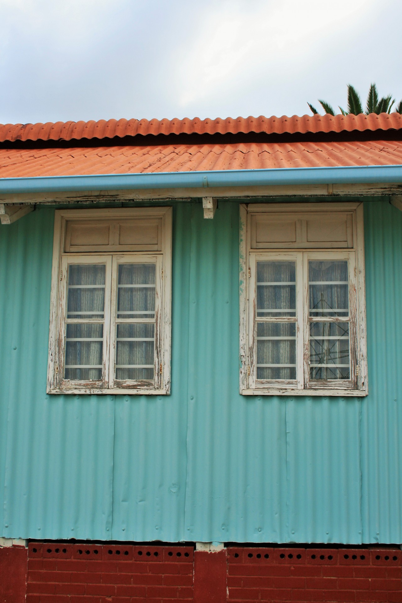 building corrugated iron pastel-green free photo