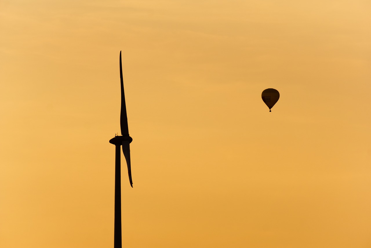 windräder  hot air balloon  sunset free photo