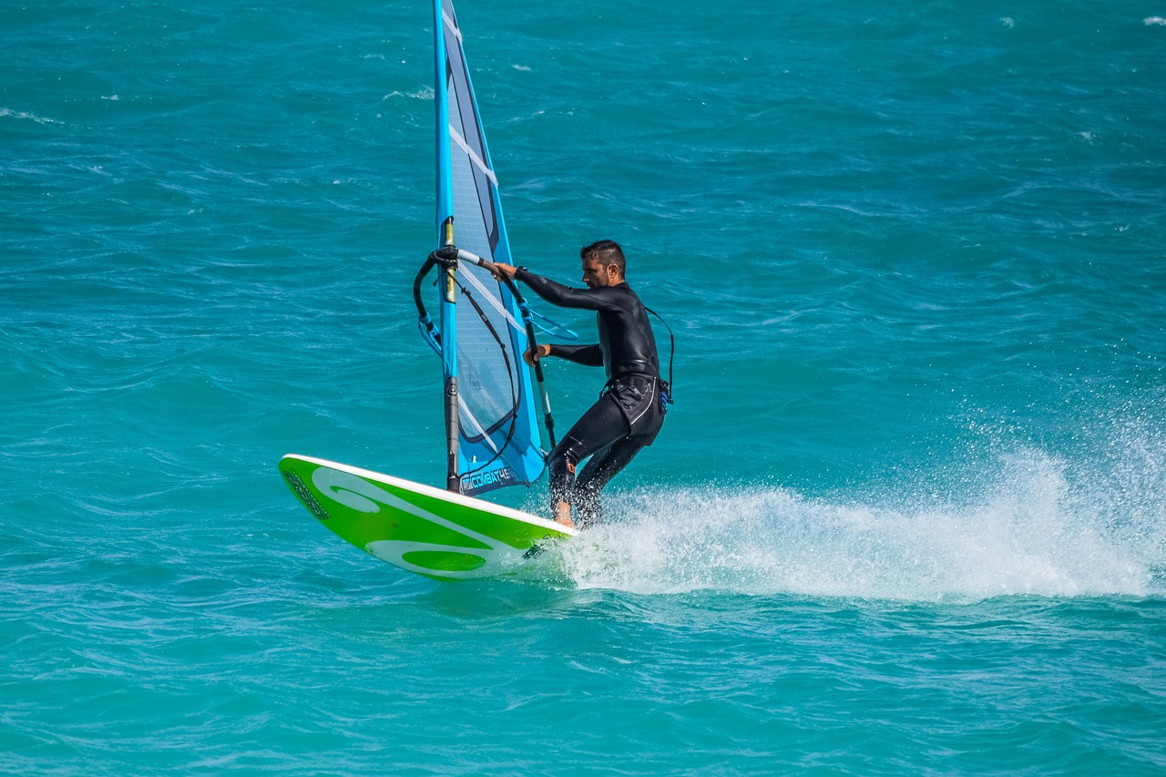 windsurfing  surfer  recreation free photo