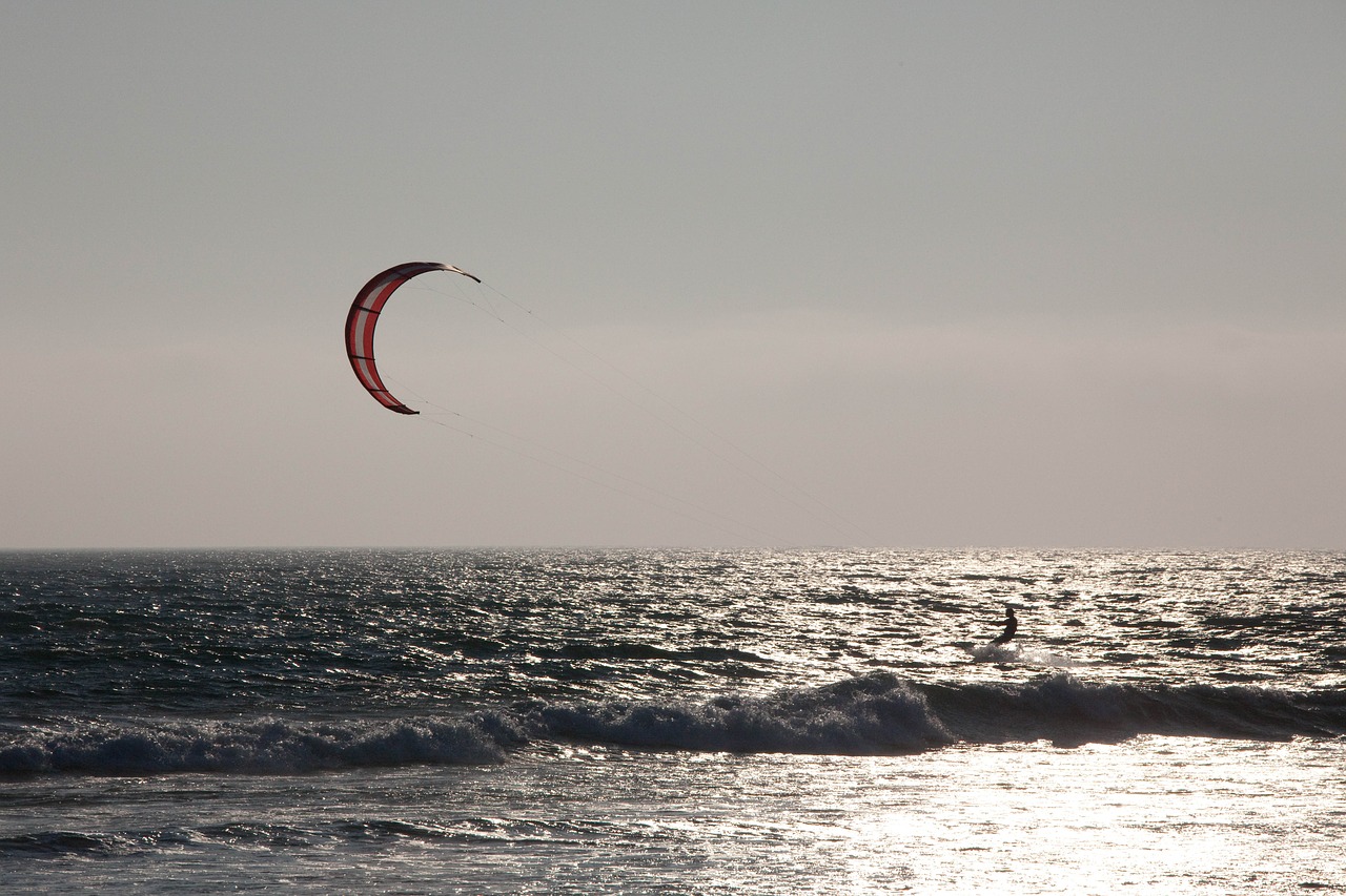 windsurfing  pacific ocean  afternoon free photo