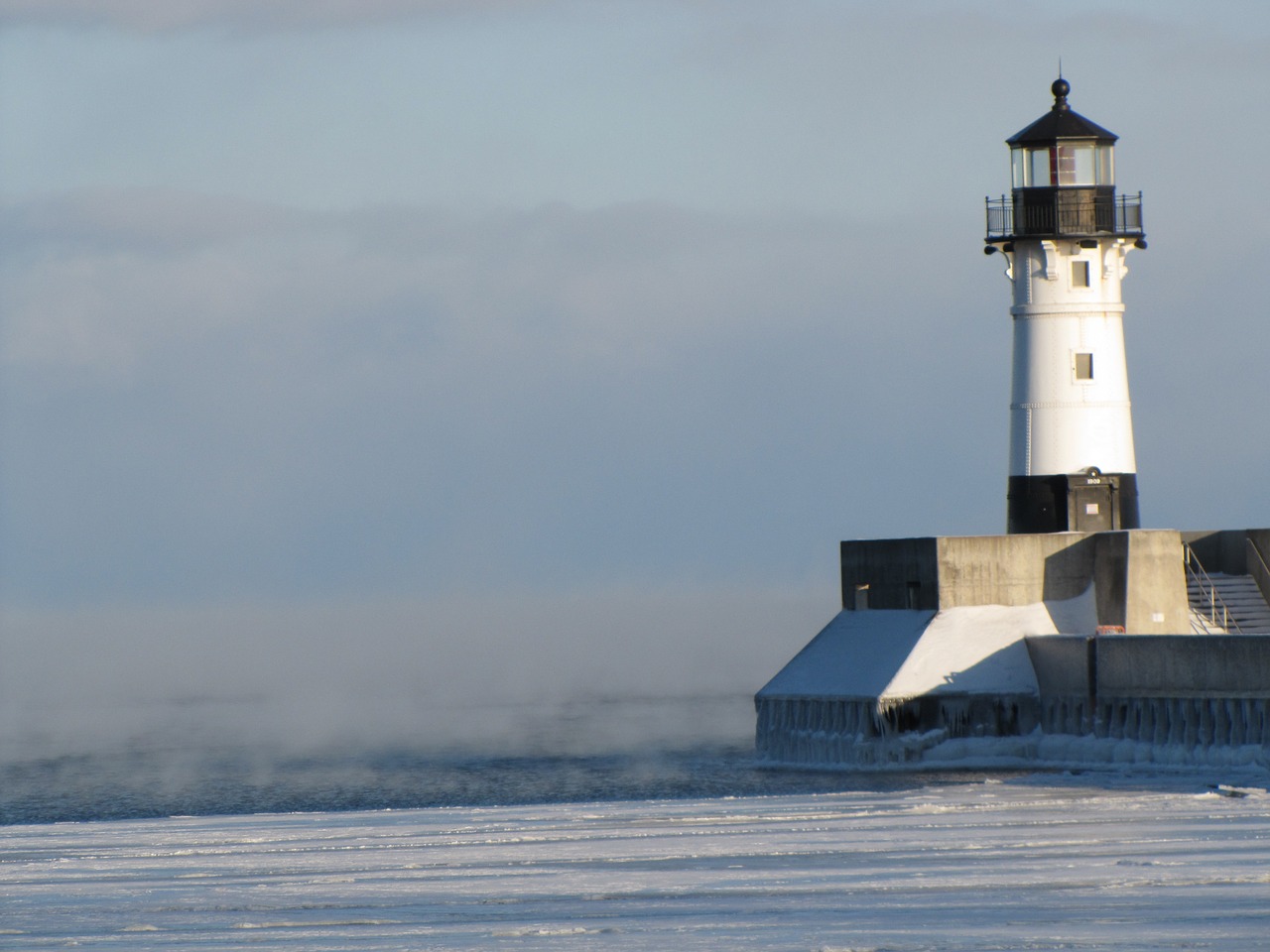 lighthouse winter cold free photo