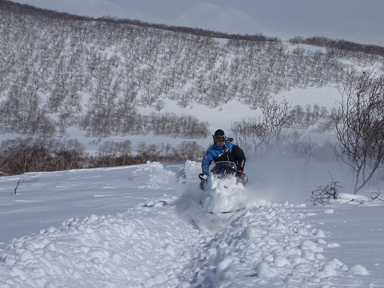 winter snowmobile vacation free photo