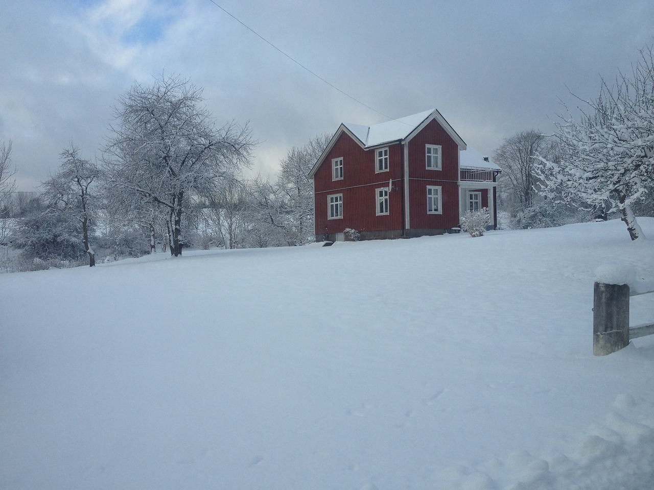 winter red cottage red house free photo