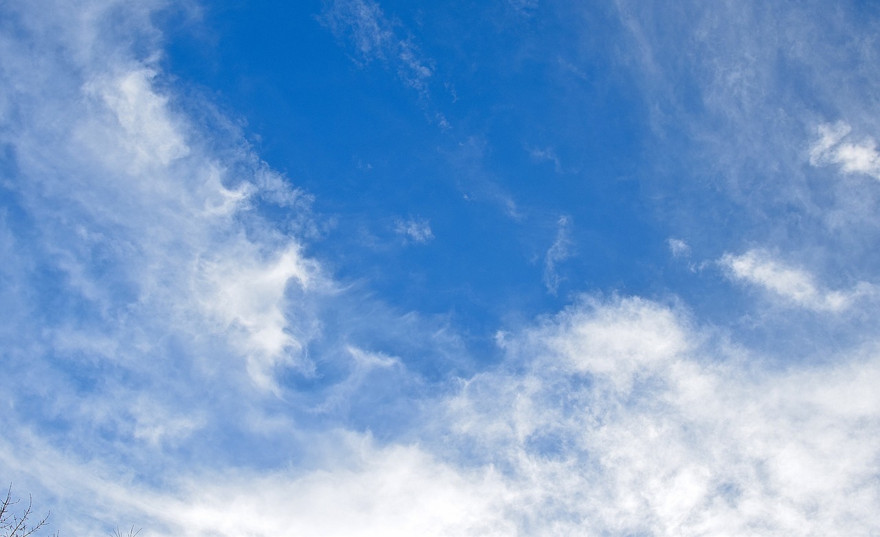 wispy clouds blue sky clouds free photo