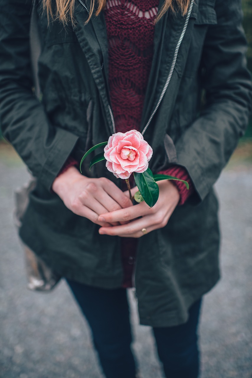 woman holding flower free photo