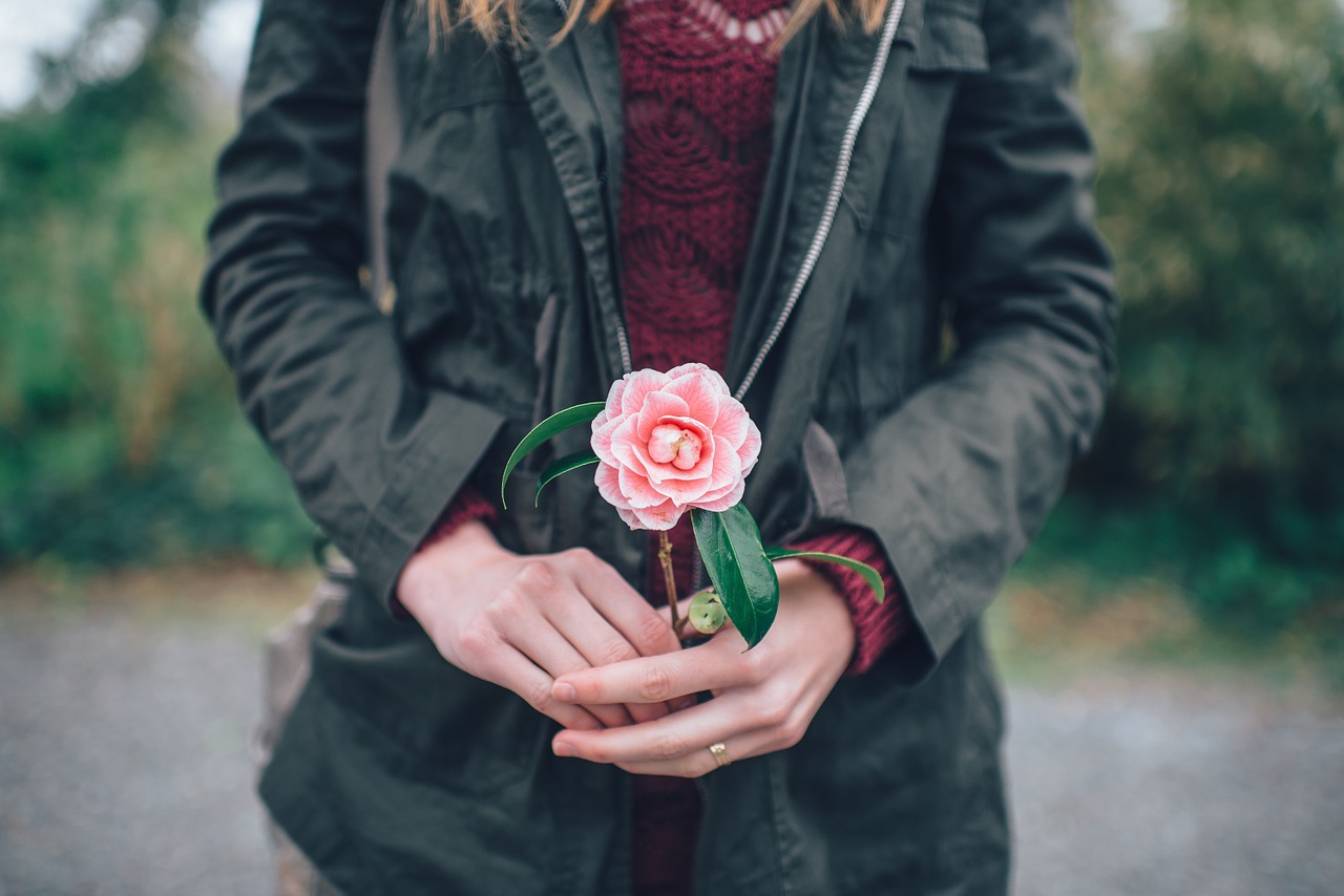 woman holding flower free photo