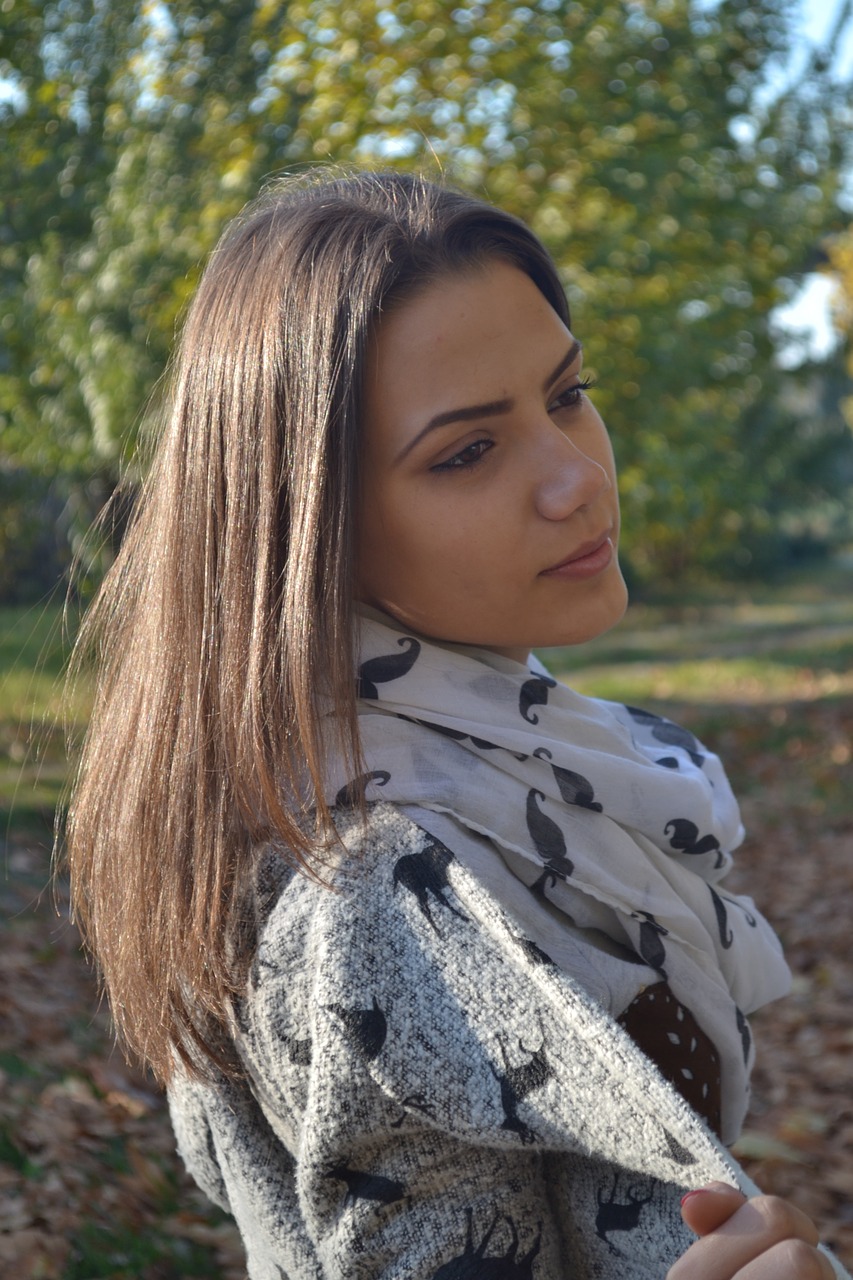 woman scarf outdoors free photo