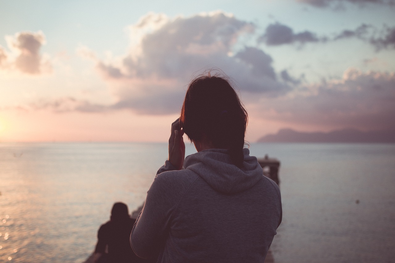 woman sunset sea free photo