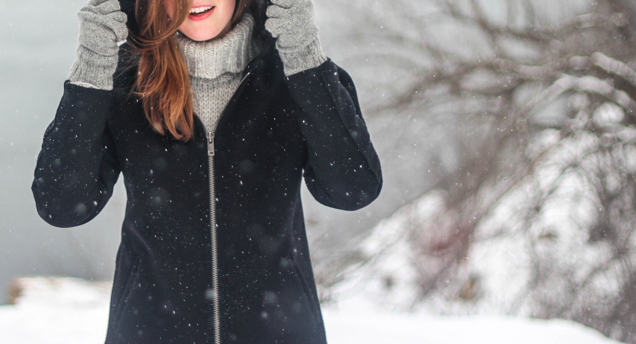 woman snowflakes winter clothing free photo