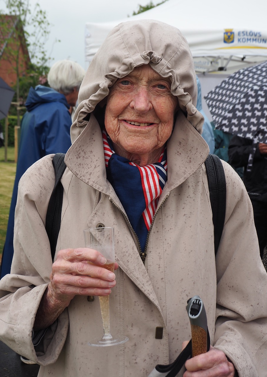 woman rain rain coat free photo