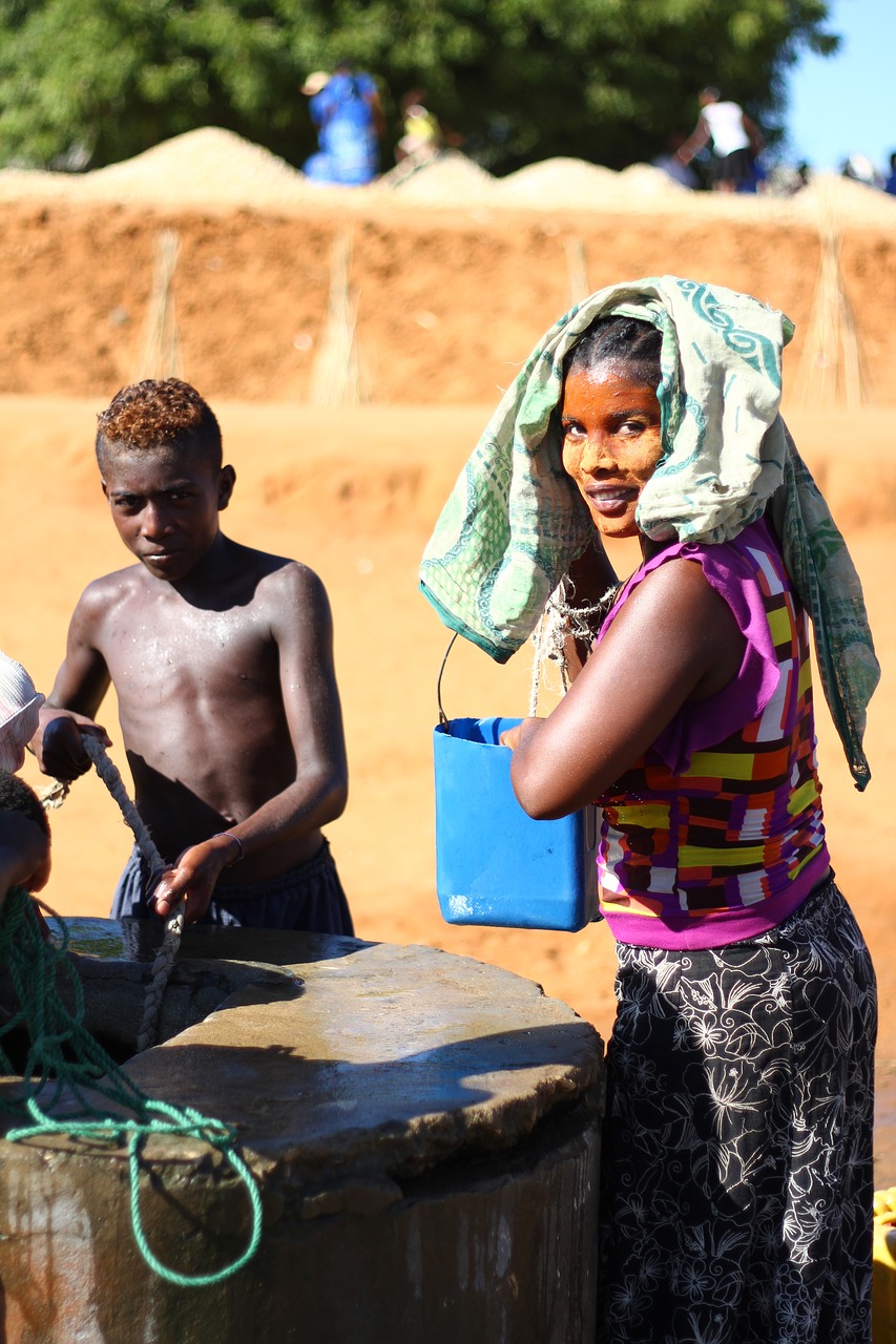 woman africa water well free photo