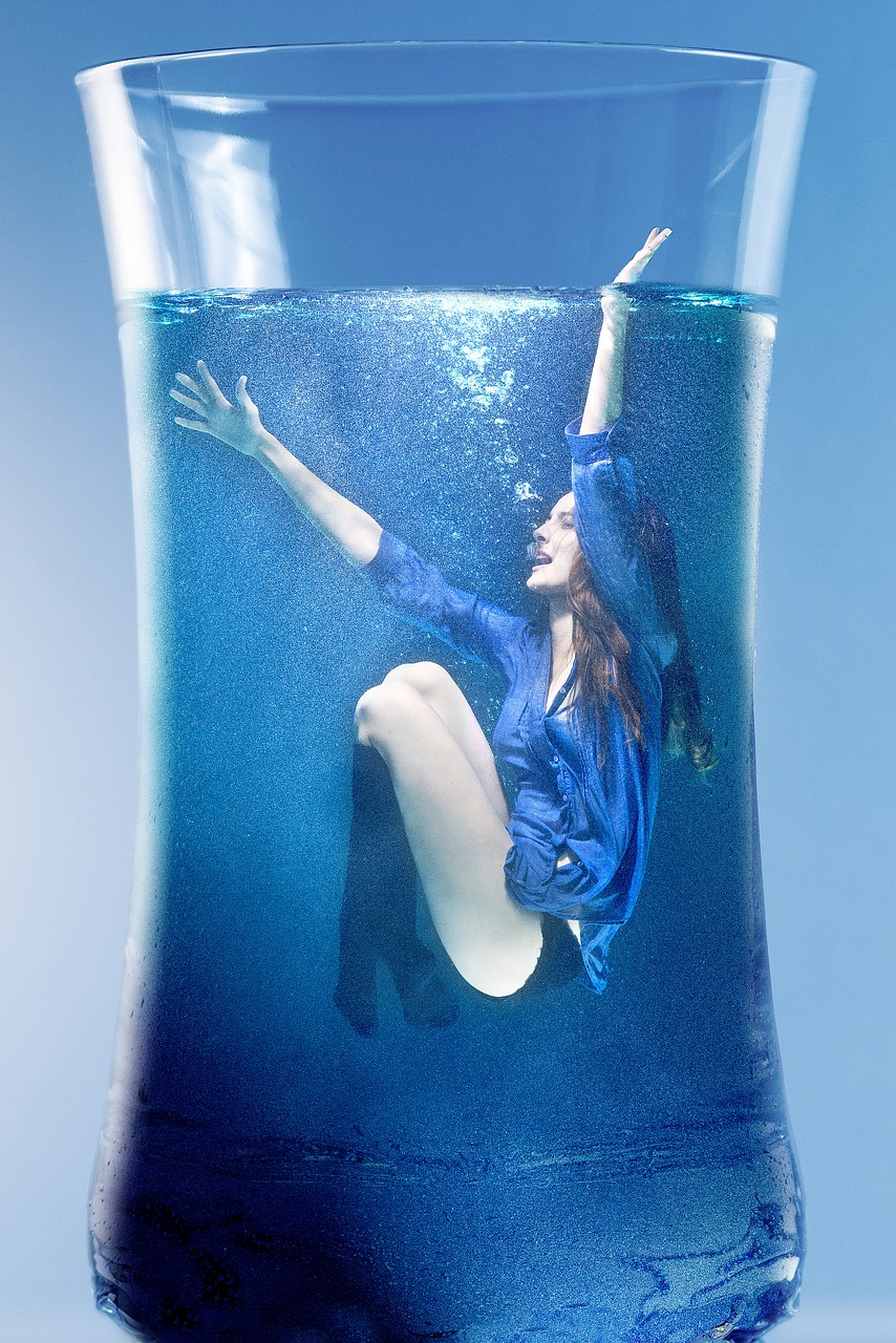 woman water submerged free photo