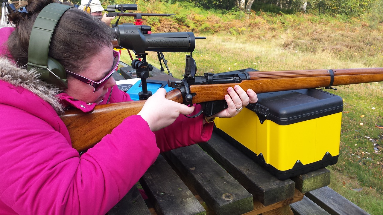 woman shooting rifle free photo