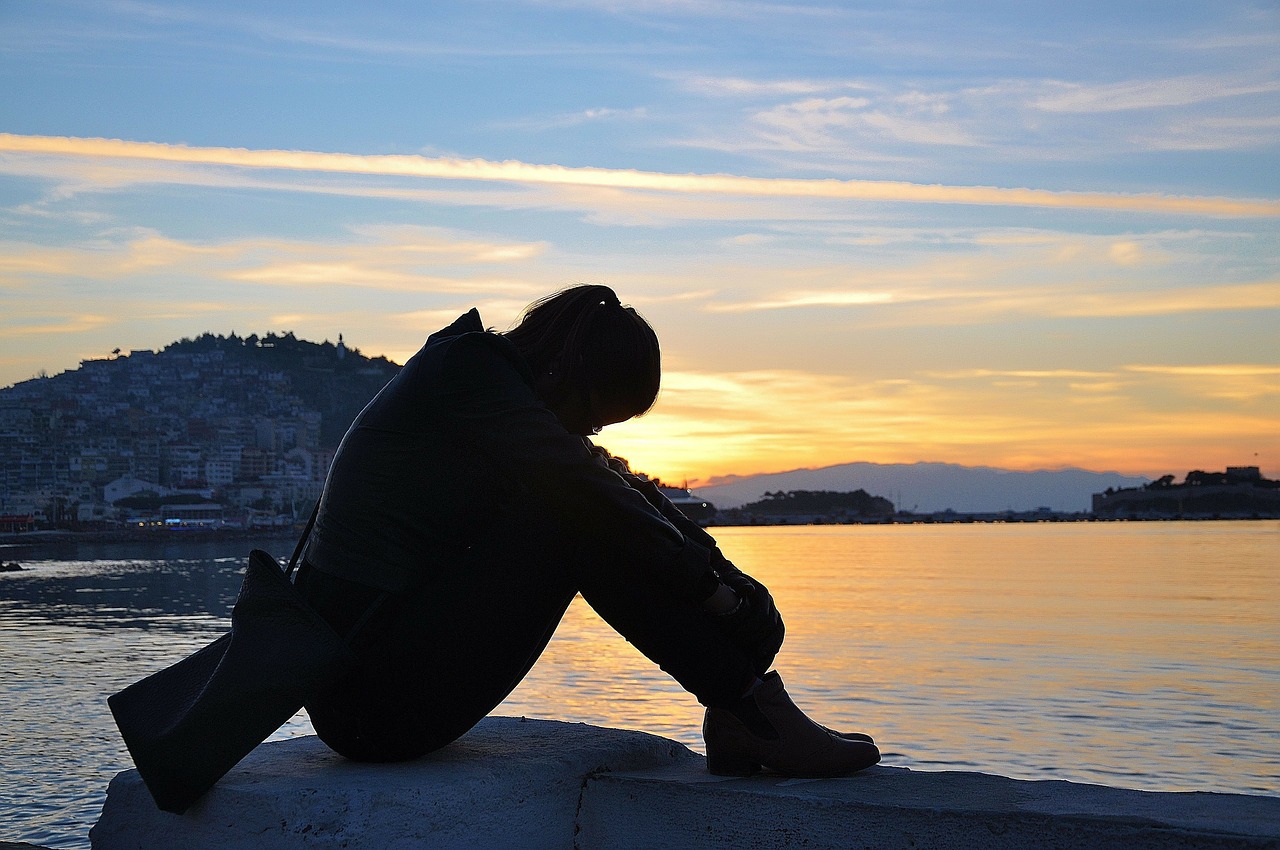 woman sitting silhouette free photo