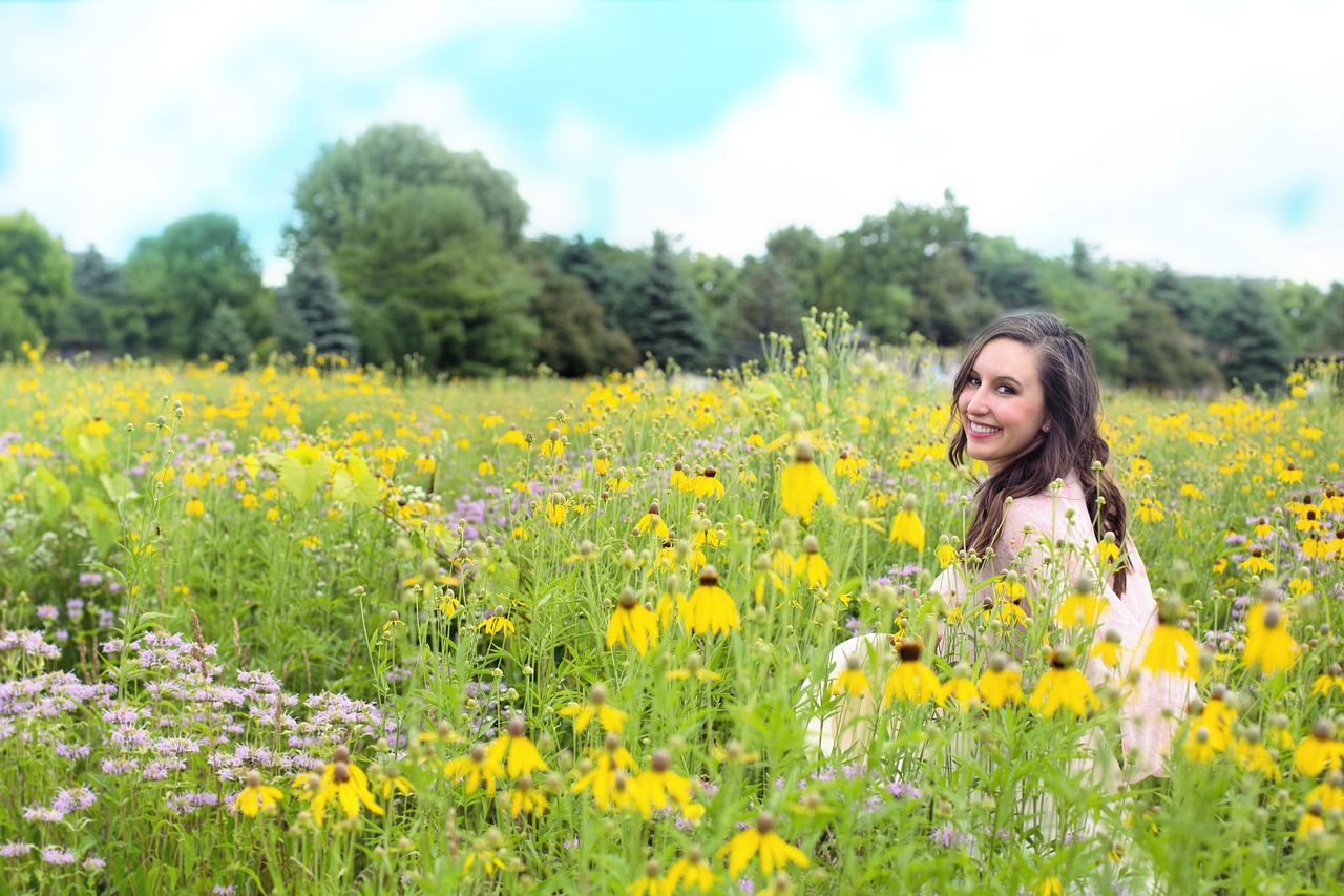 woman  meadow  wildflowers free photo