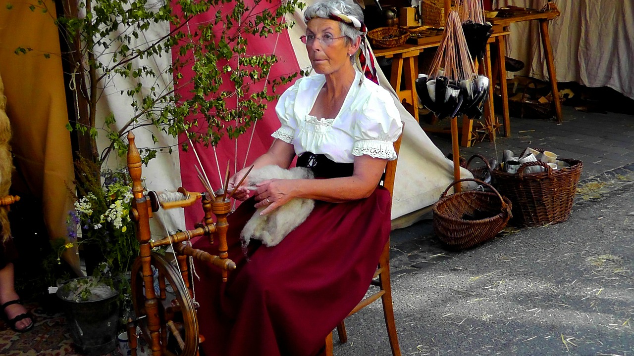 woman spinning wheel wool free photo