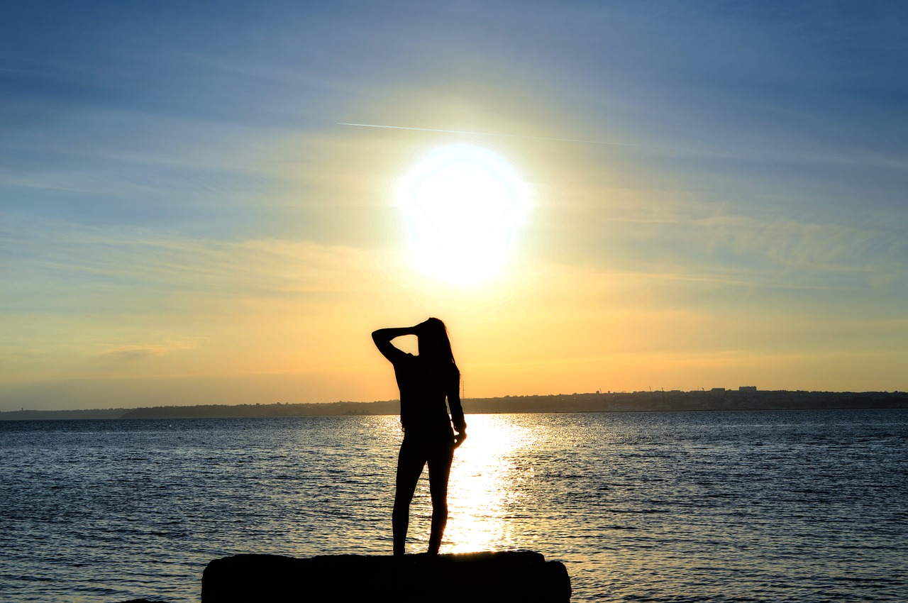 woman silhouette sea free photo