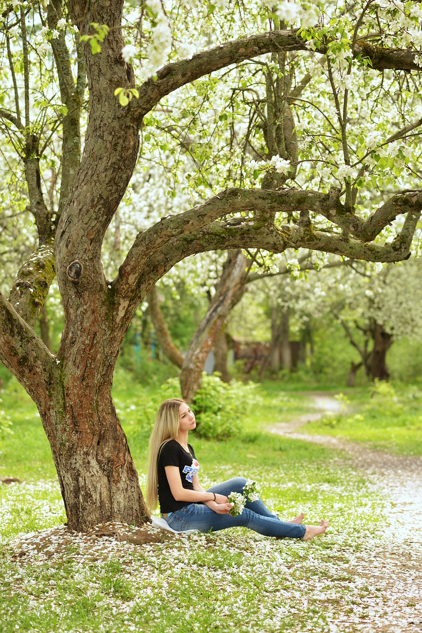 woman  tree  flowers free photo