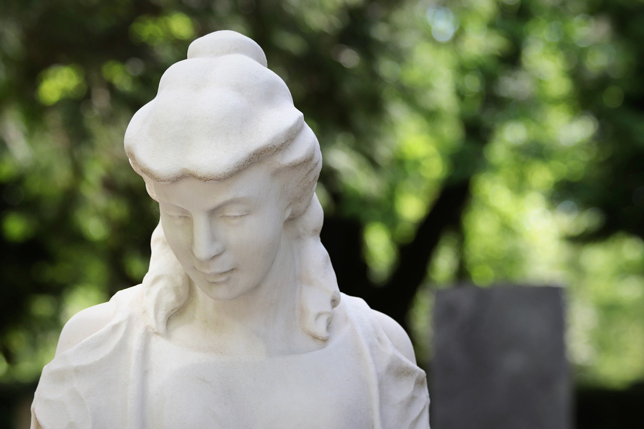 woman  white stone  sculpture free photo