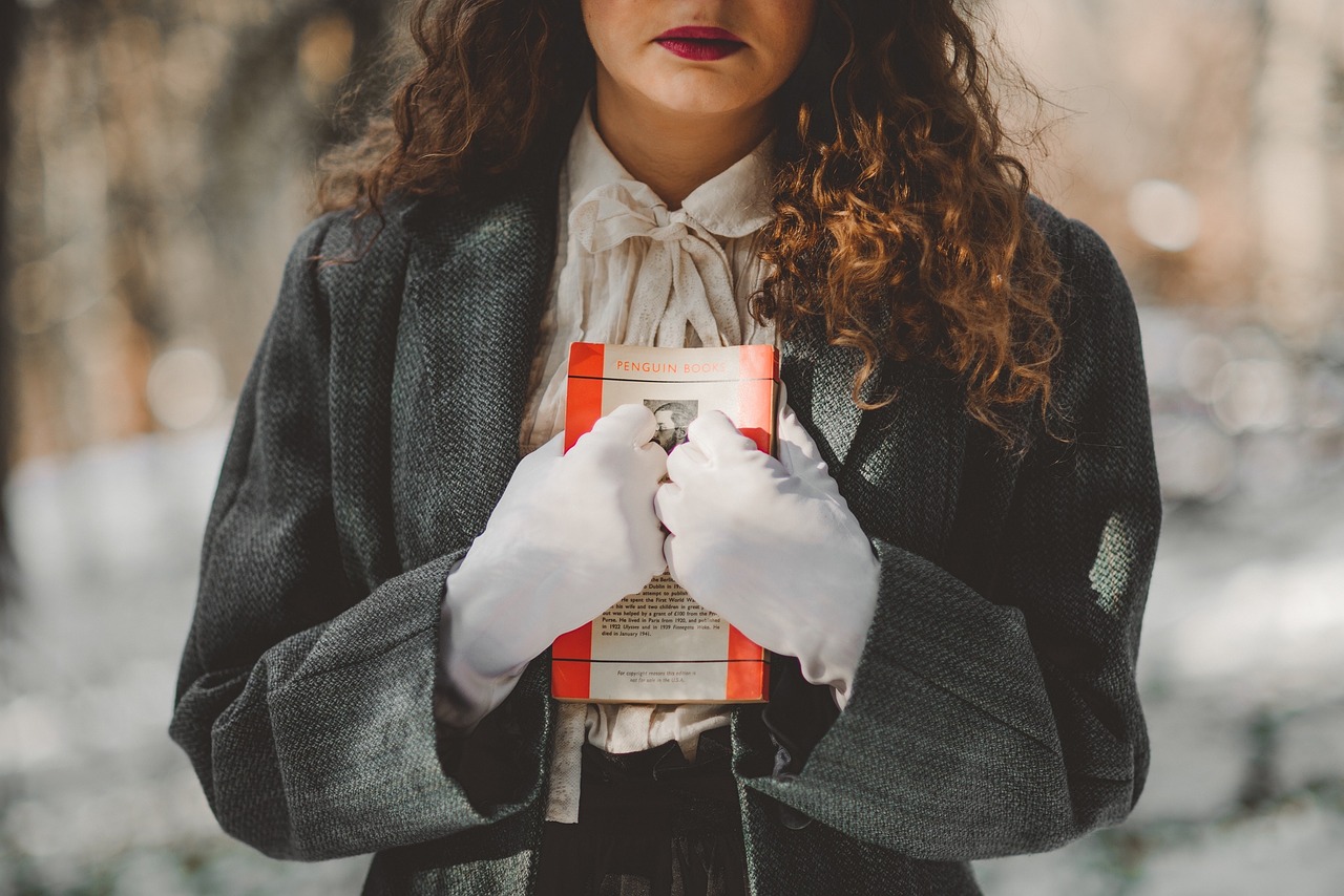 woman book clutching free photo