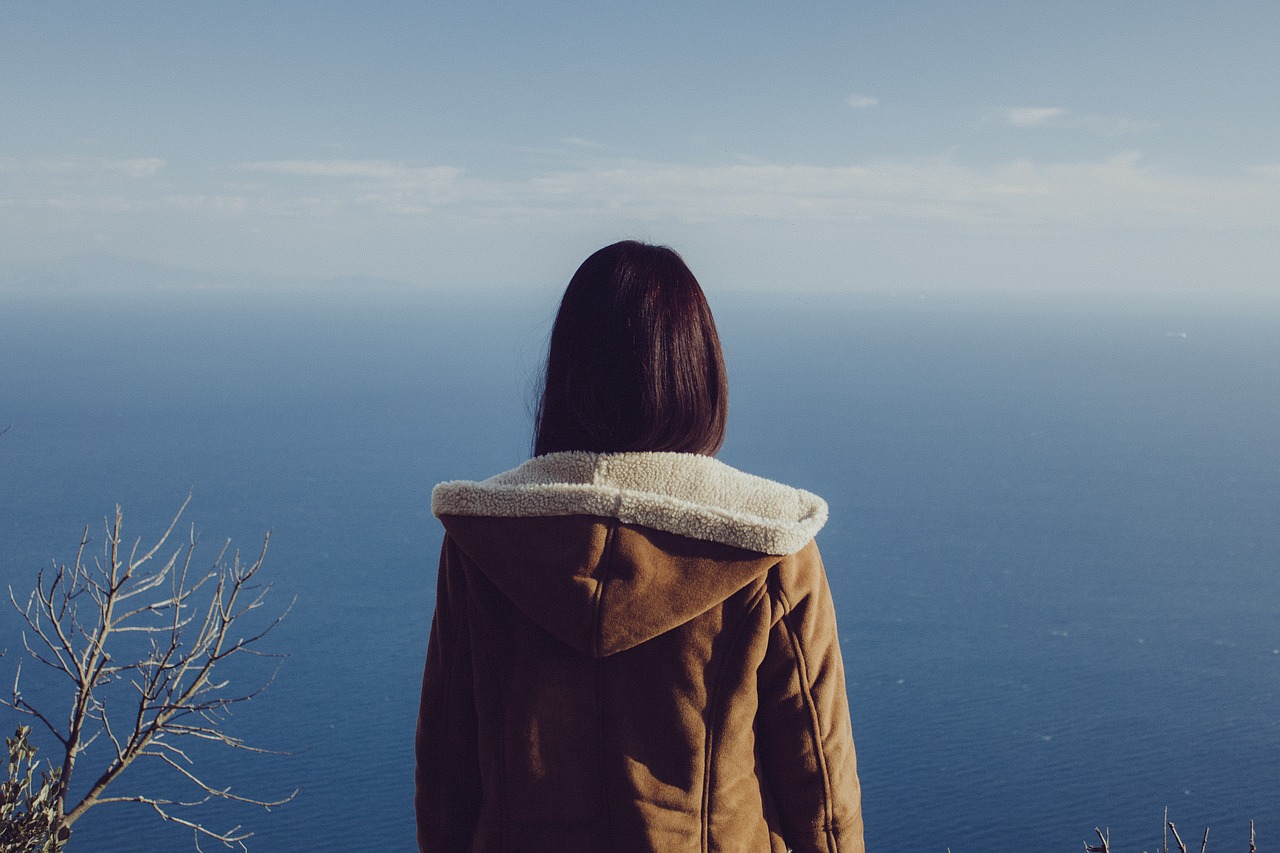 woman gazing ocean free photo