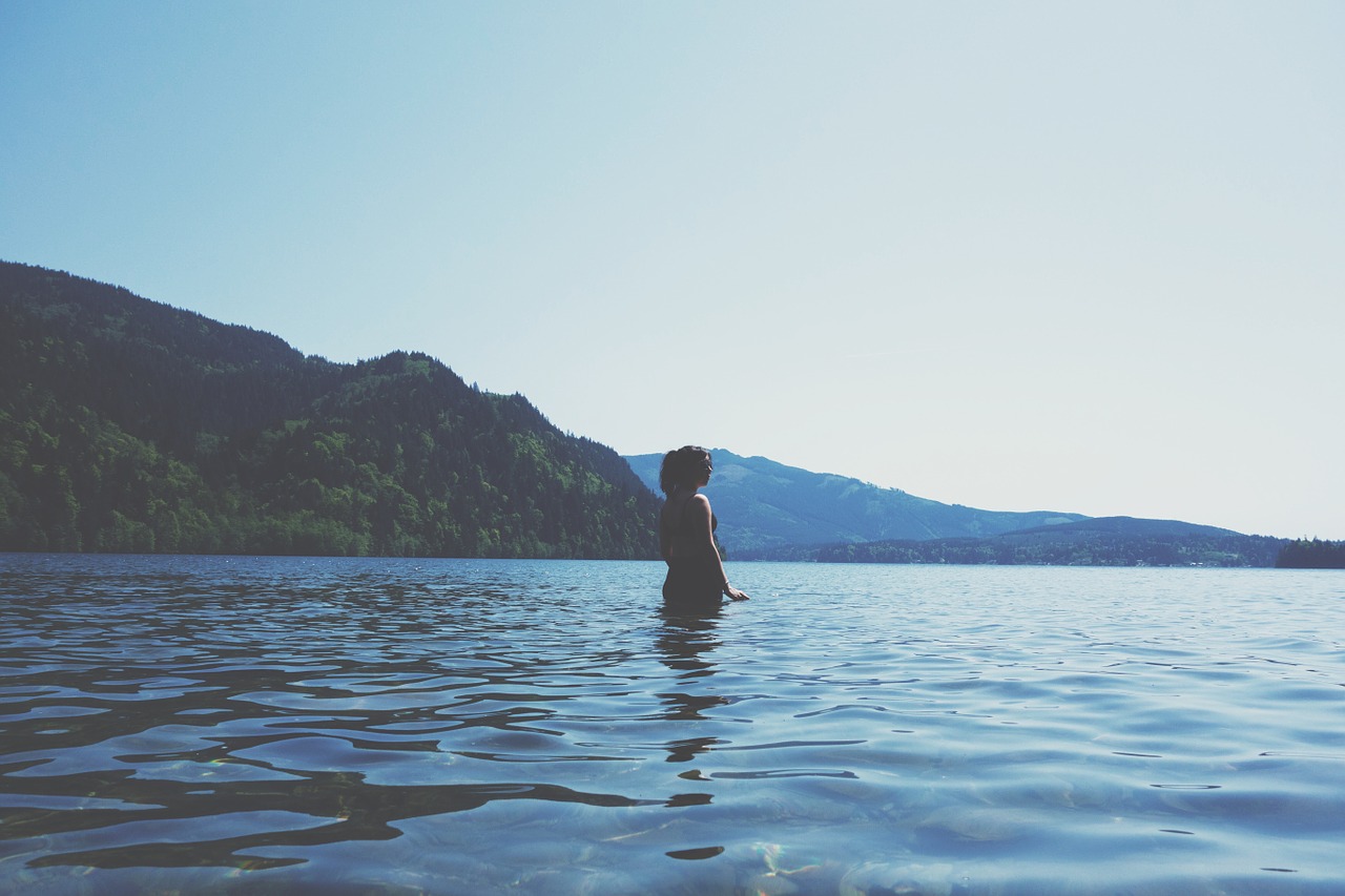woman bathing lake free photo