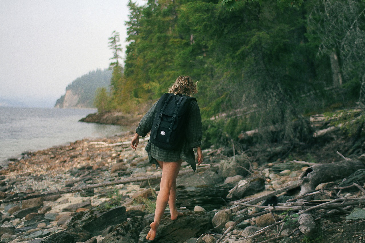 woman hiking trees free photo