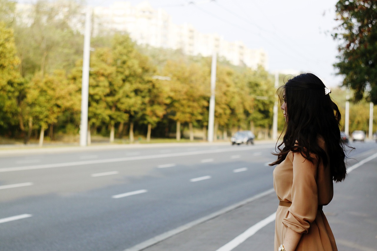 woman standing road free photo