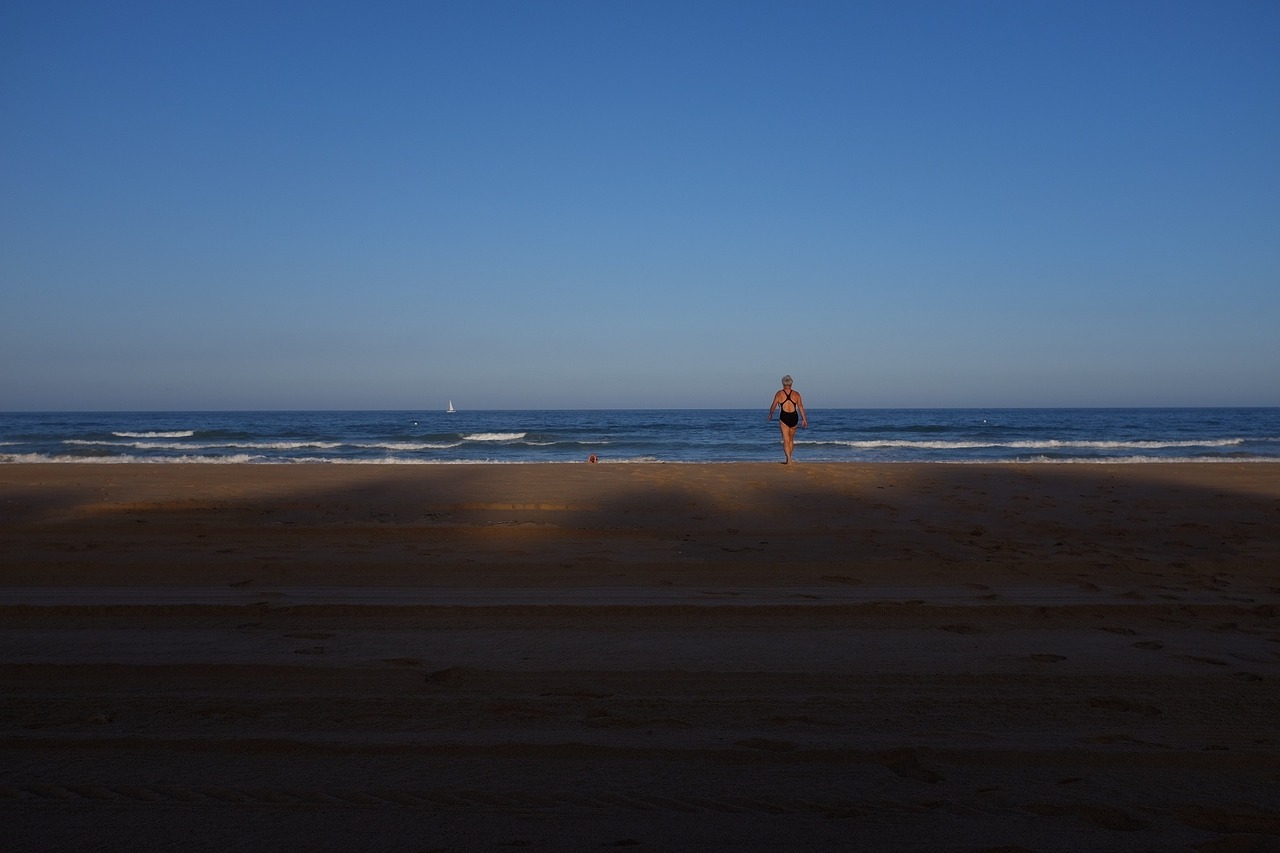 woman beach swimsuit free photo