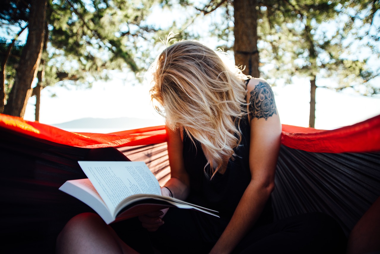 woman reading book free photo