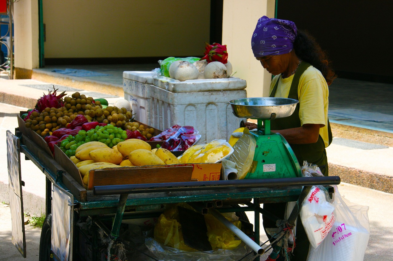 woman food stall fruits free photo