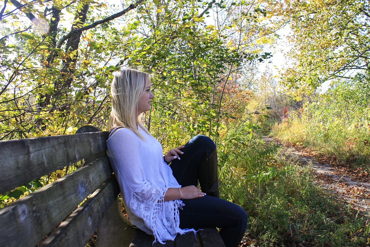 woman thinking bench free photo