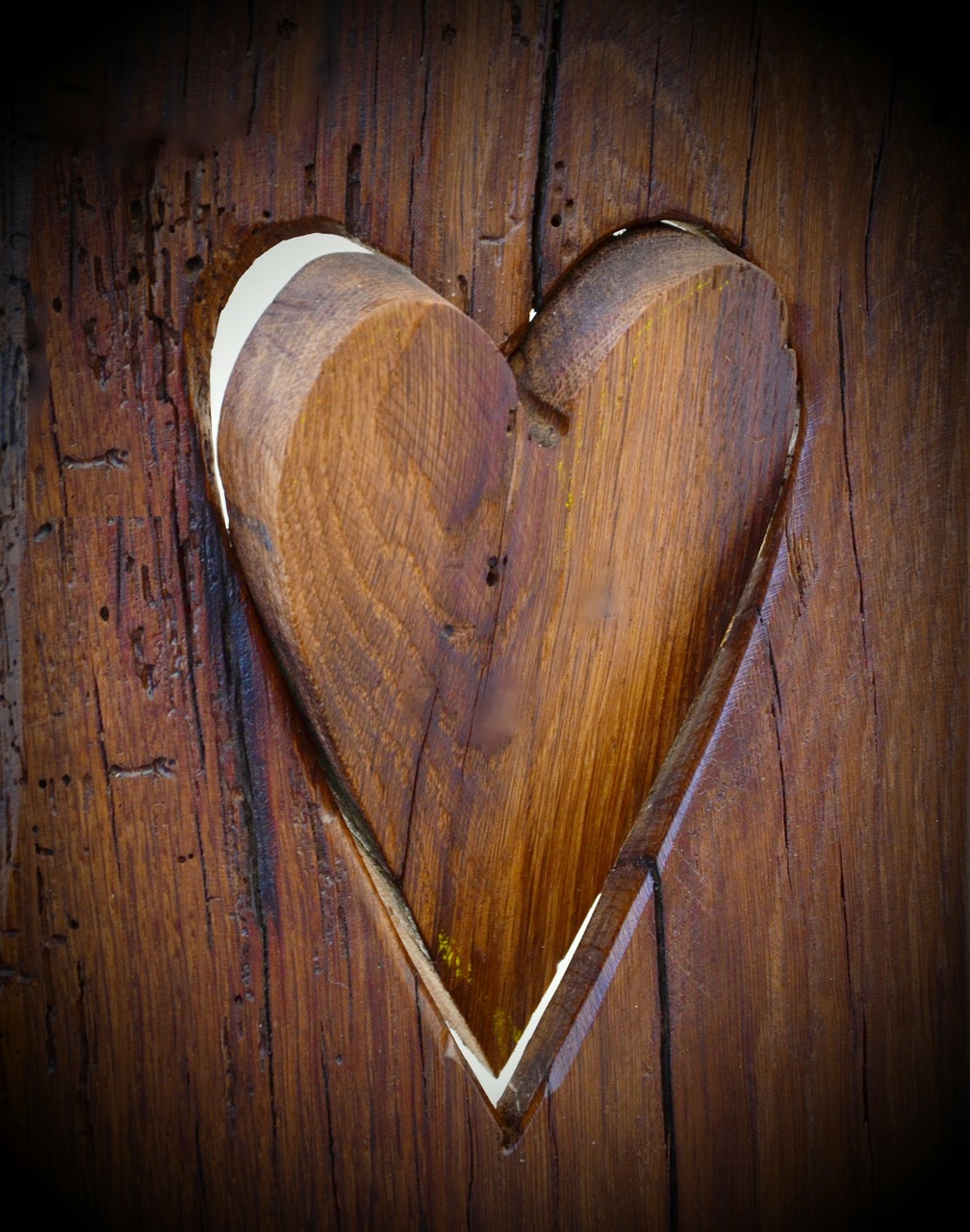 wood dark wood heart free photo