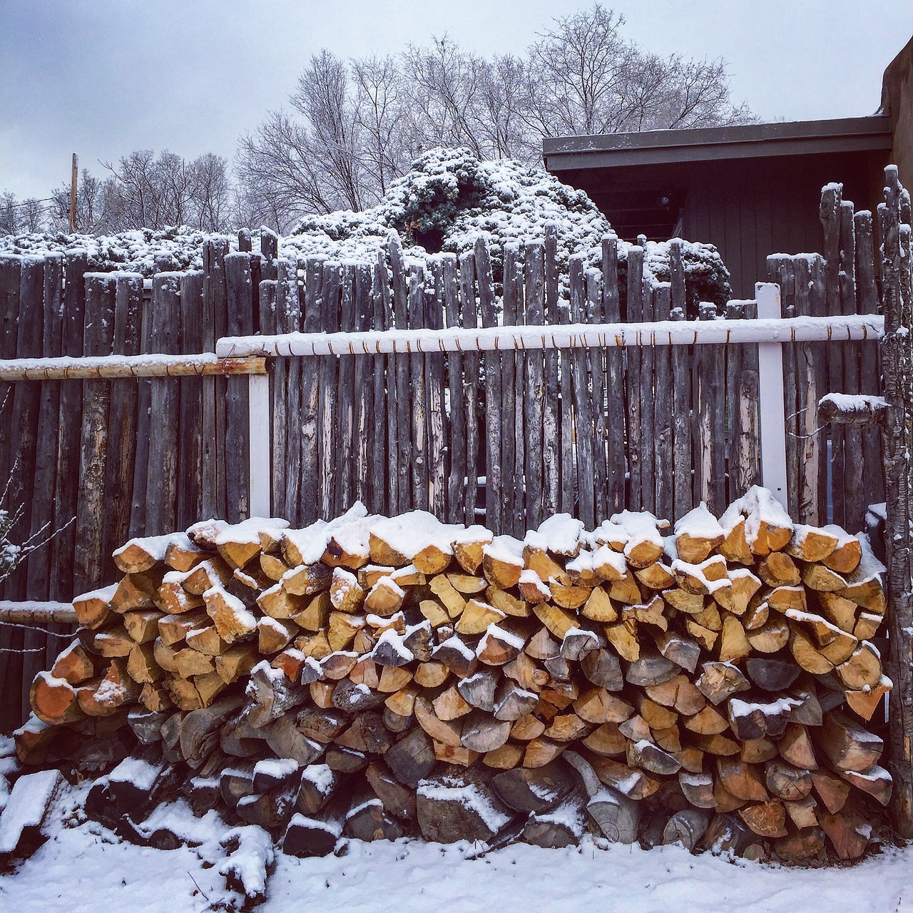wood snow wood pile free photo
