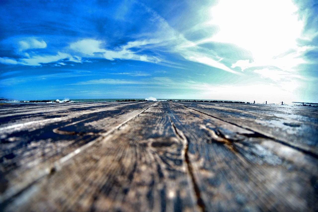 wood boardwalk clouds free photo