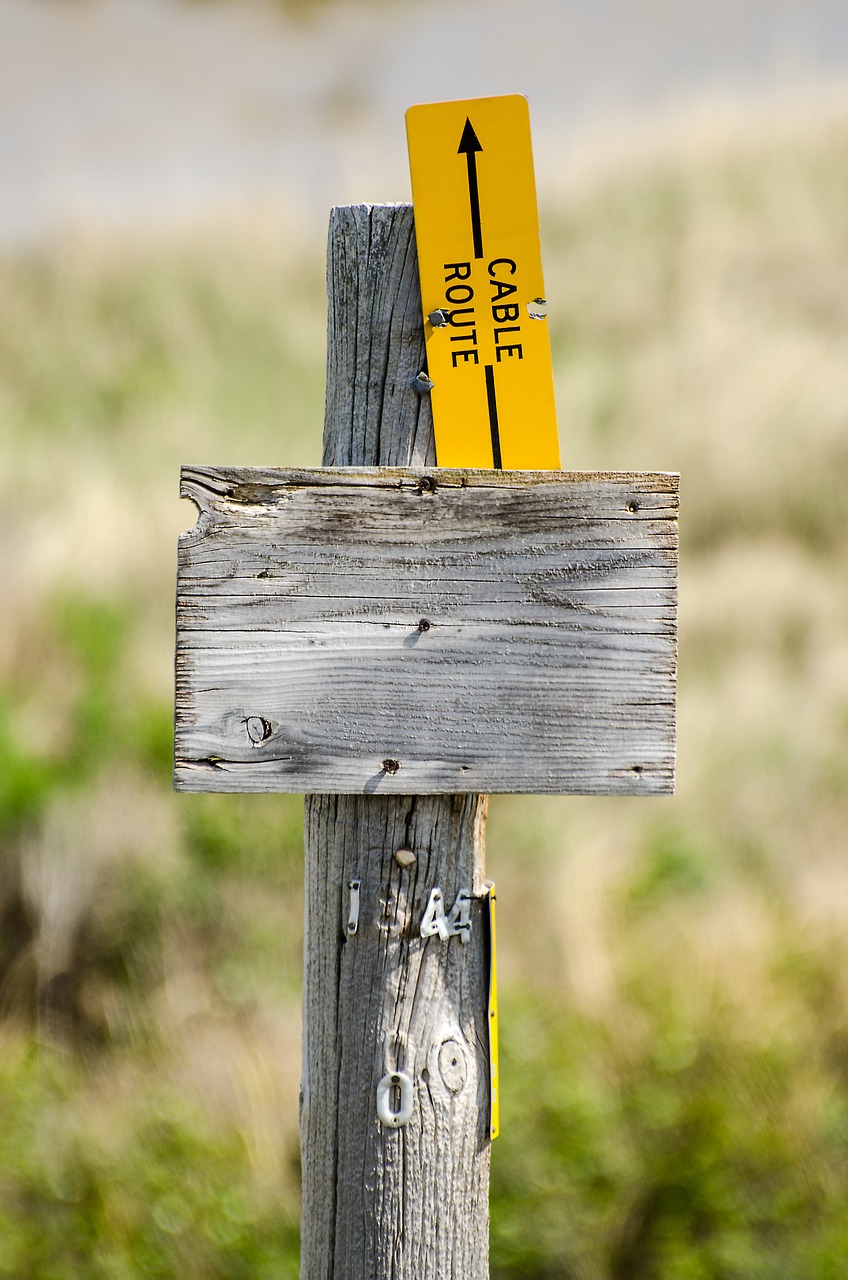wood sign cable route wood post free photo
