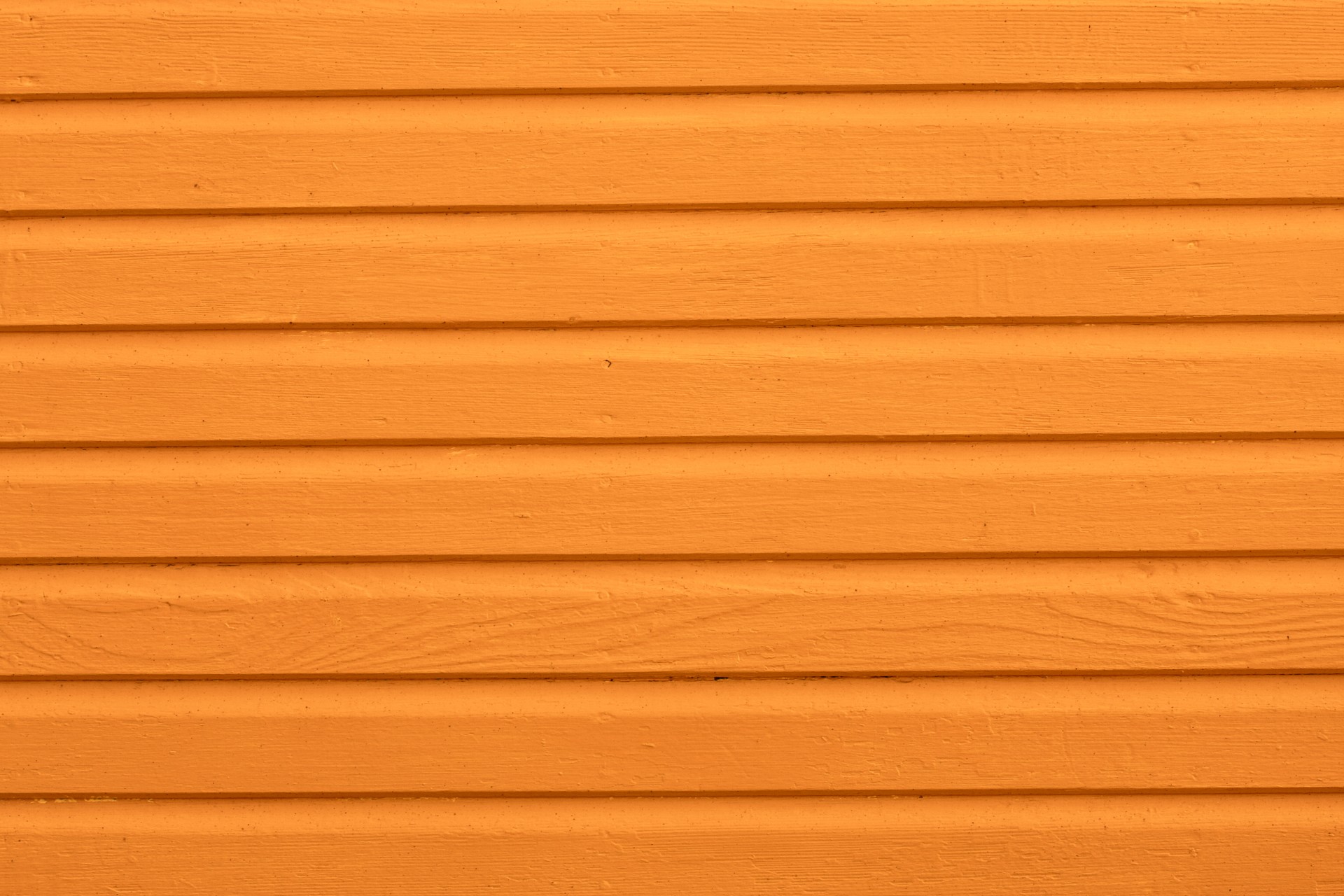 Khi kết hợp hai yếu tố cơ bản là đường vân của gỗ và màu sắc cam đều đặn, bạn sẽ nhận được một kết quả tuyệt vời: bức hình nền gỗ màu cam tuyệt đẹp và đầy tính thẩm mĩ. Hãy tải hình nền này về để sử dụng trên điện thoại, máy tính bảng và máy tính để bàn của bạn.