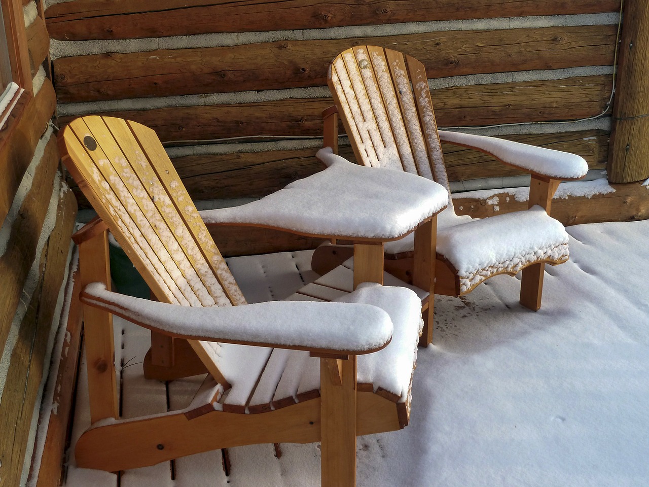 wooden garden chairs snow covered free photo