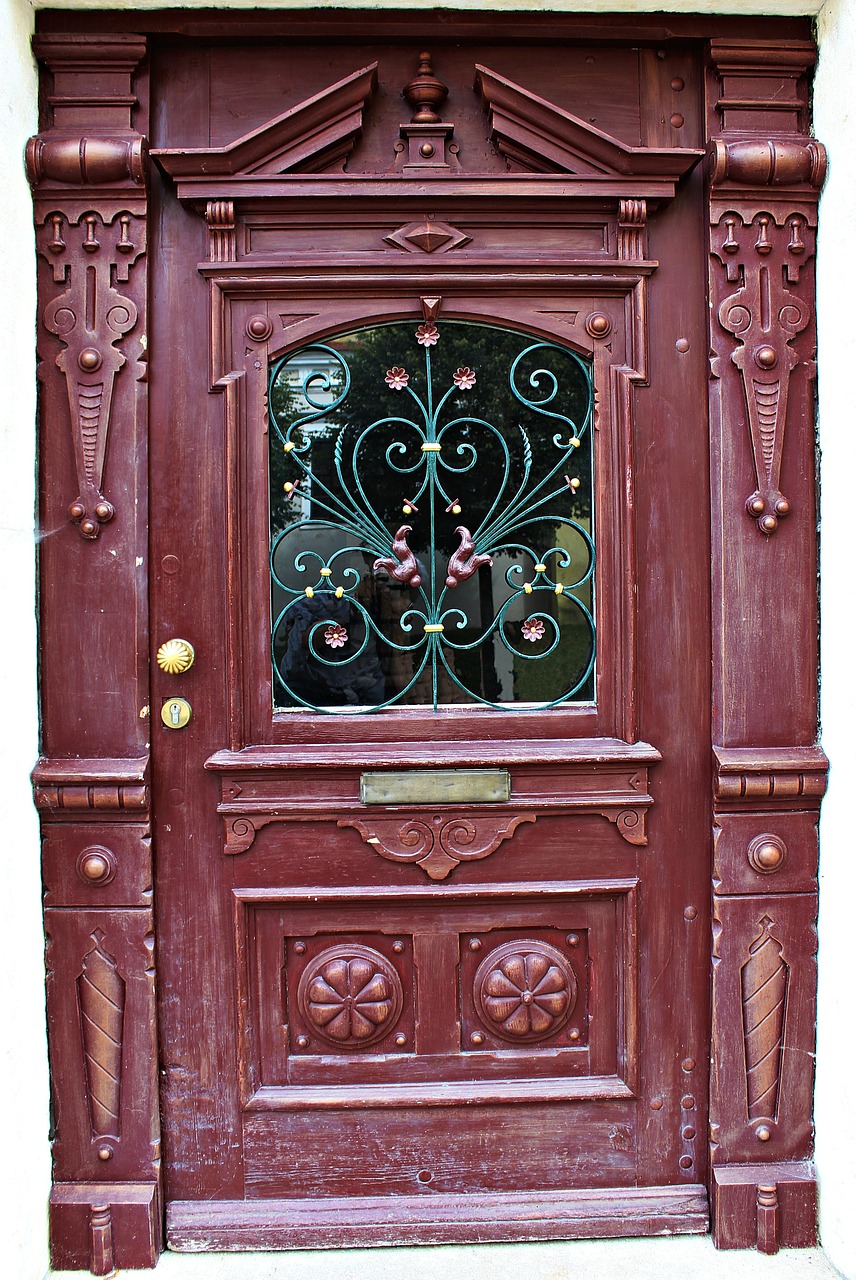 wooden door door carving free photo